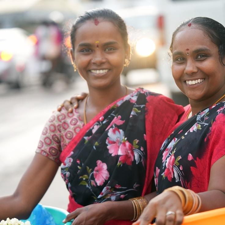 Kaveri Mehta, Lead Design Curator at Paddle Breeze Port, reviewing corporate floral arrangements